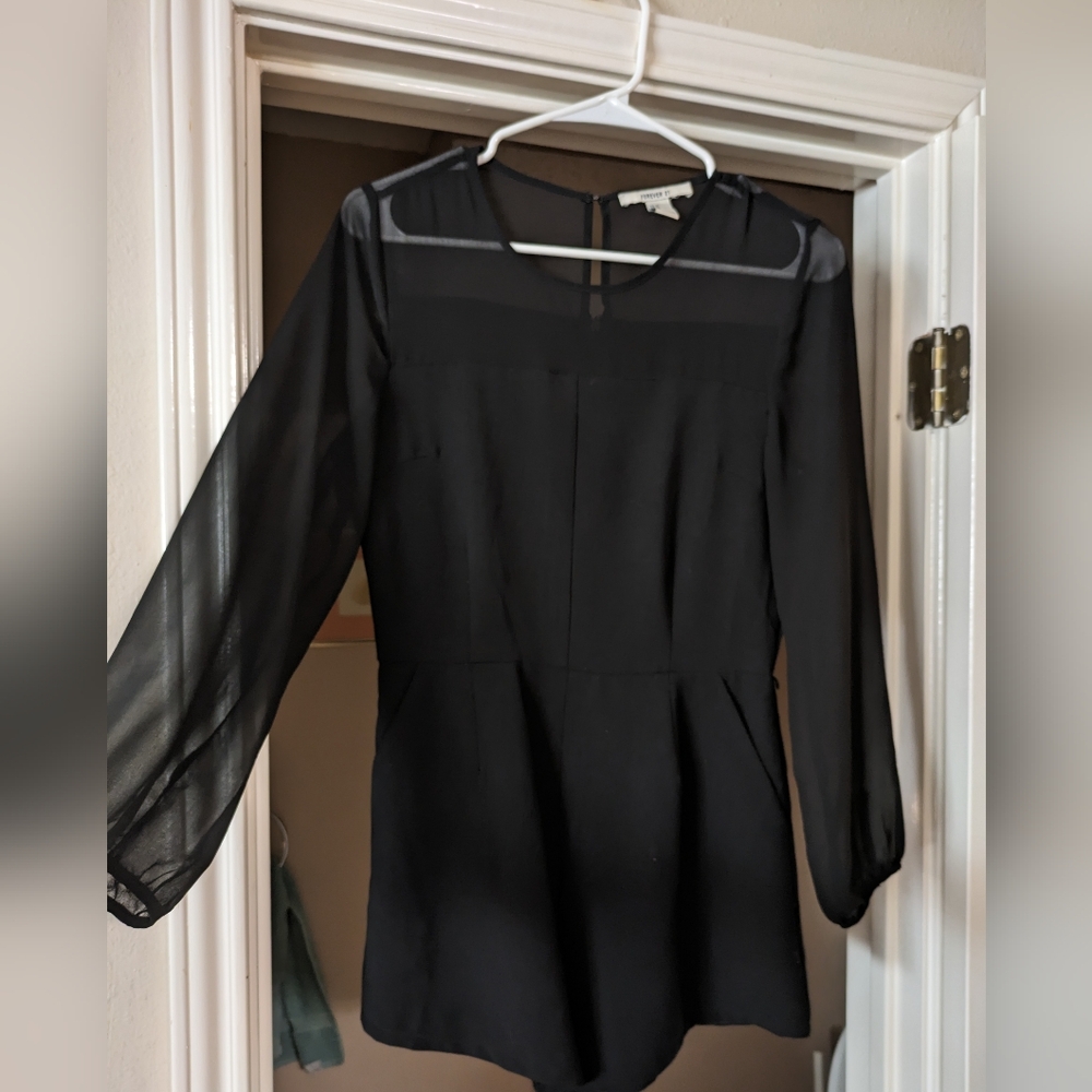 Black romper with sheer sleeves